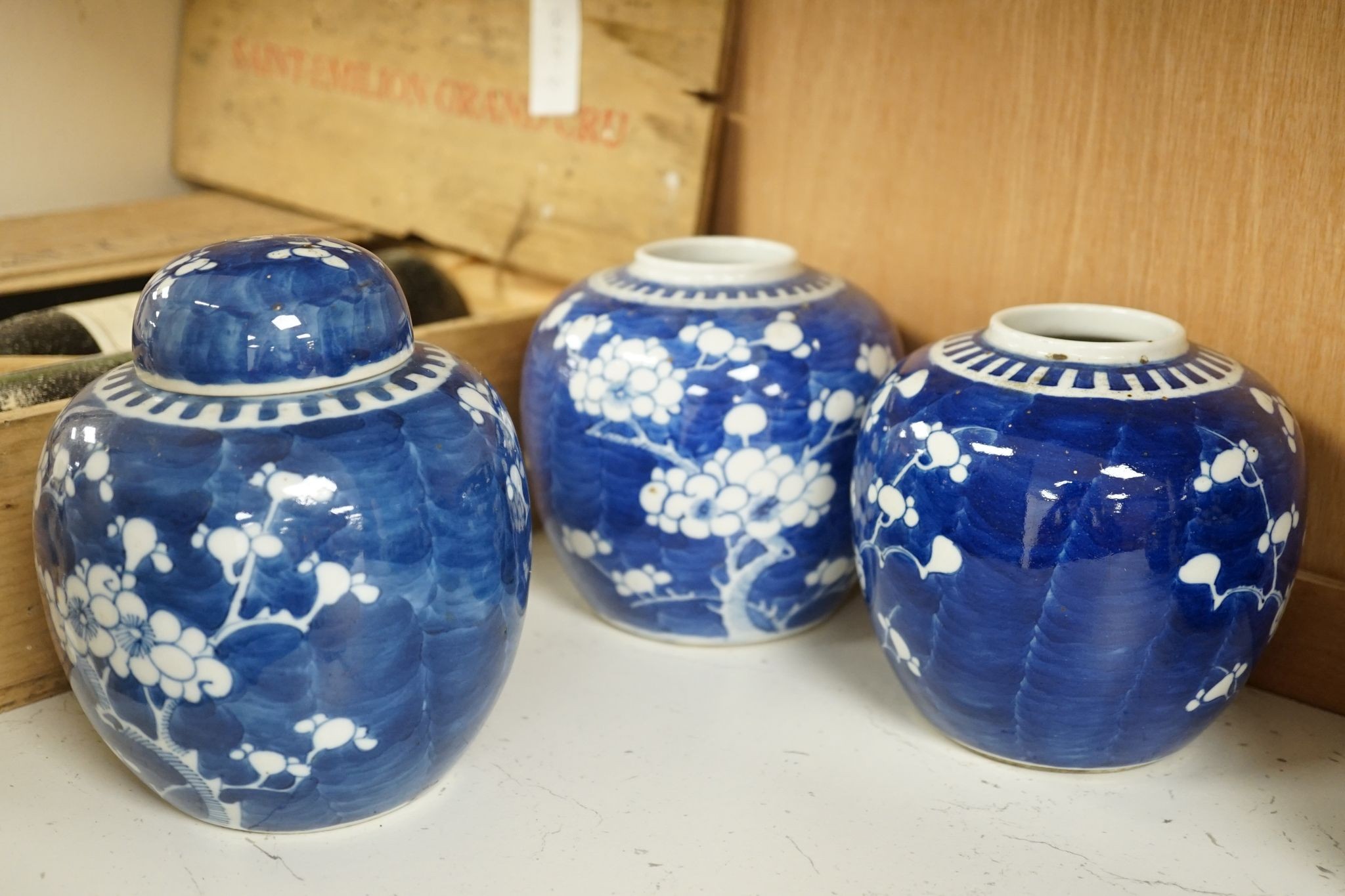 A pair of Chinese blue and white vases and eleven jars, six with covers., Vase and matching cover 28 cms high.